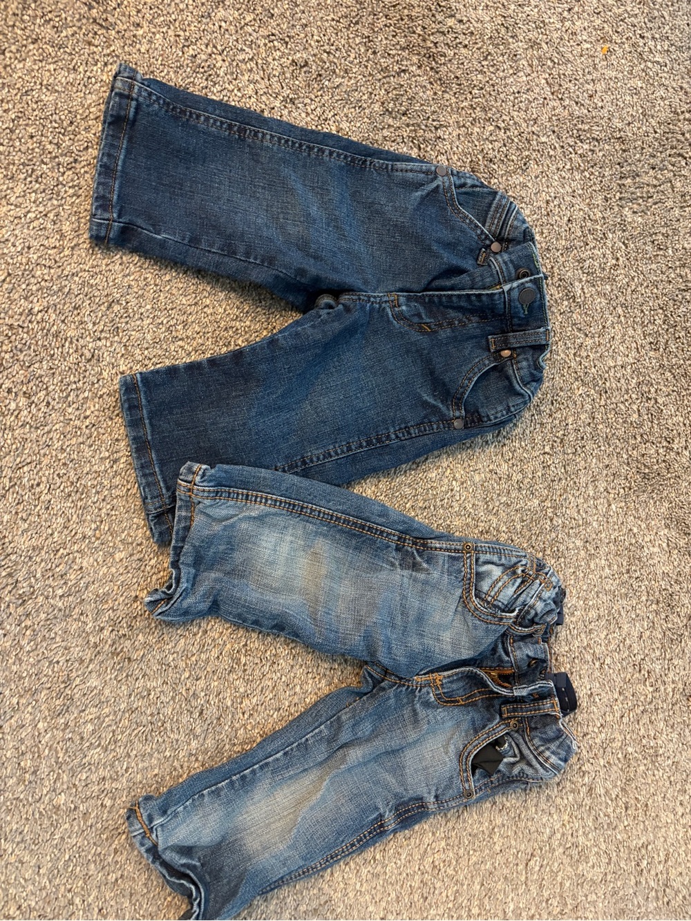 2 pairs of Wrangler infant jeans. 1T (12m)